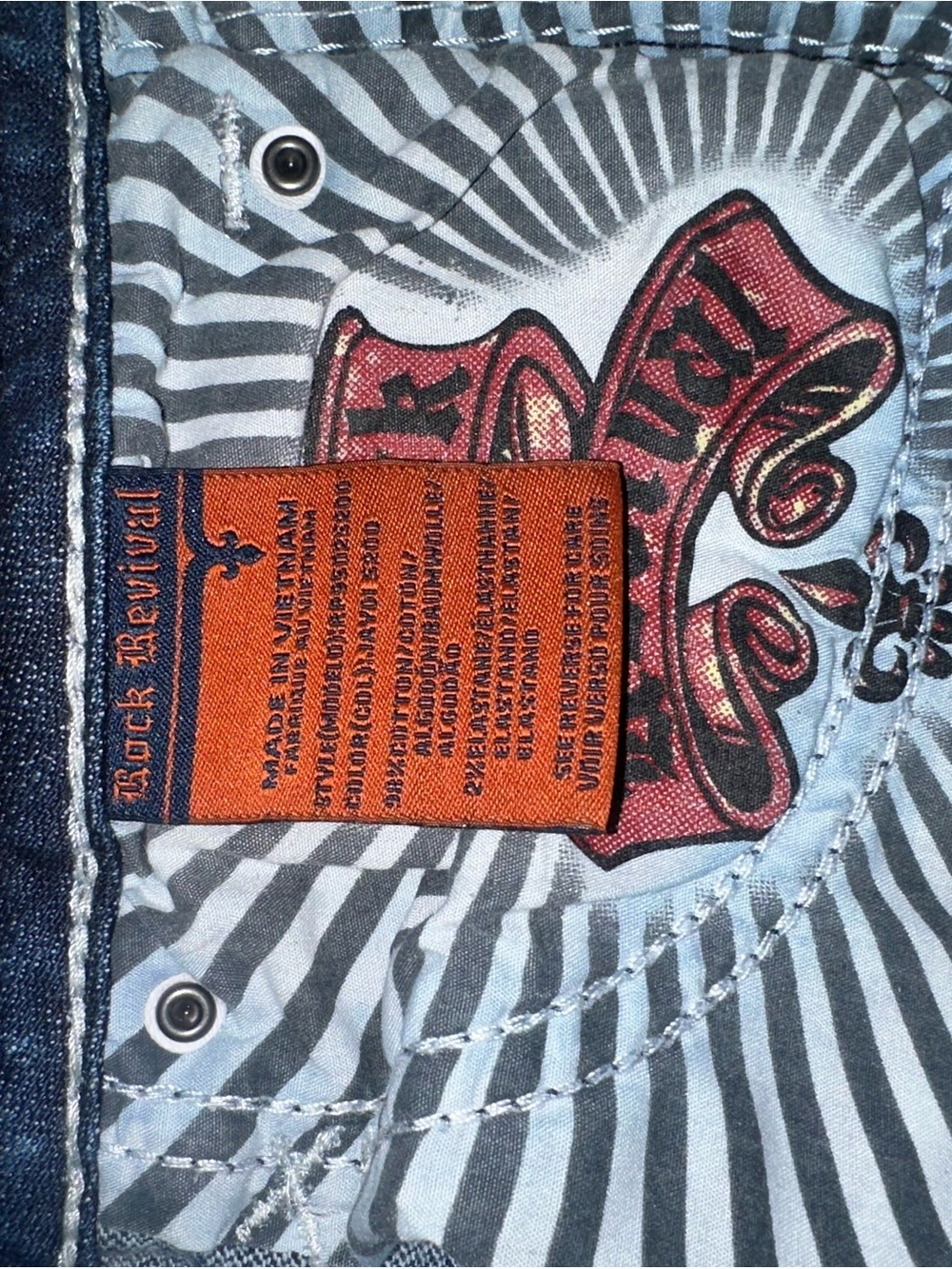 Rock Revival Men's Blue Denim Jeans with Graphic Pocket Lining